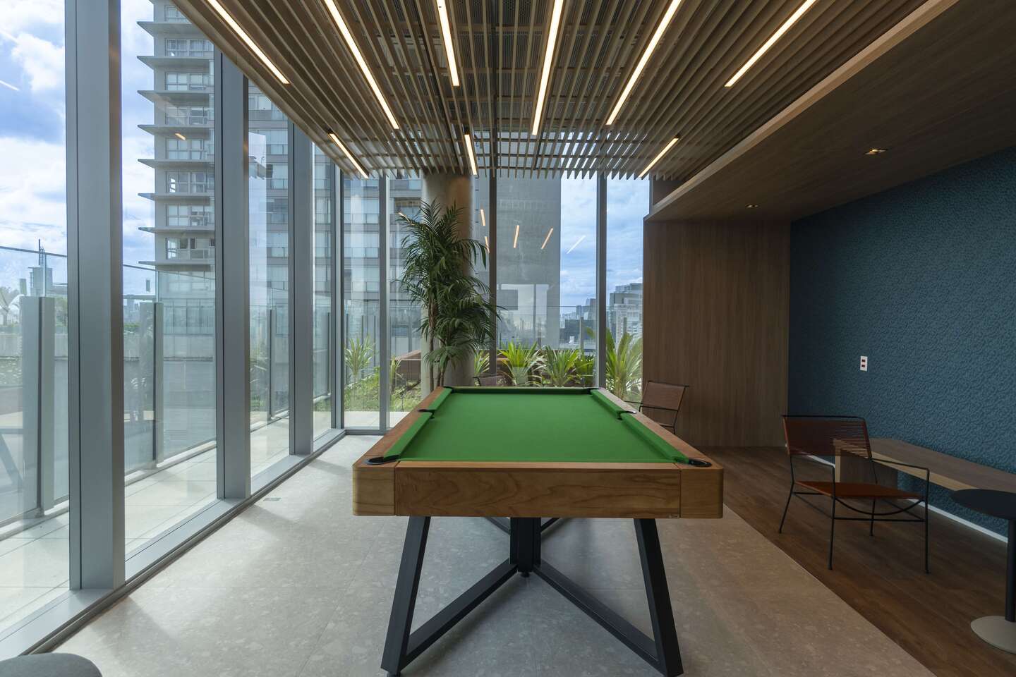 Sala de jogos do River South Residences, foto real